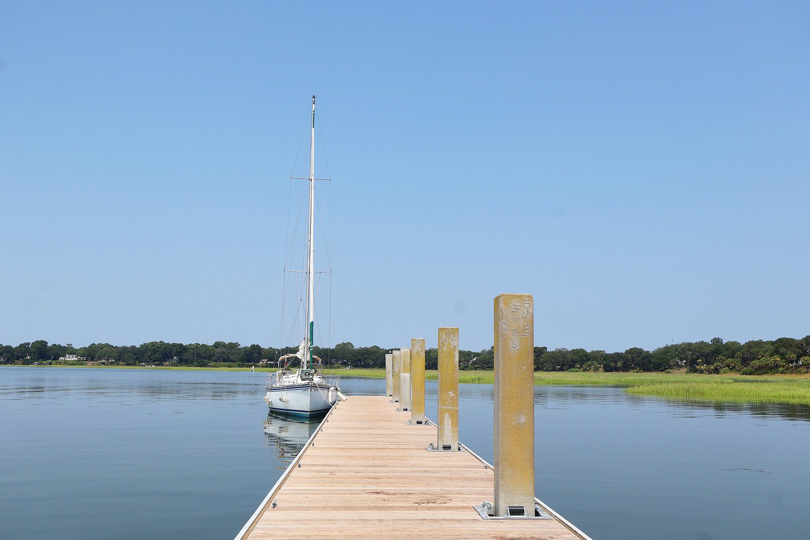A boat docked on the water near the best bed and breakfast Beaufort SC.